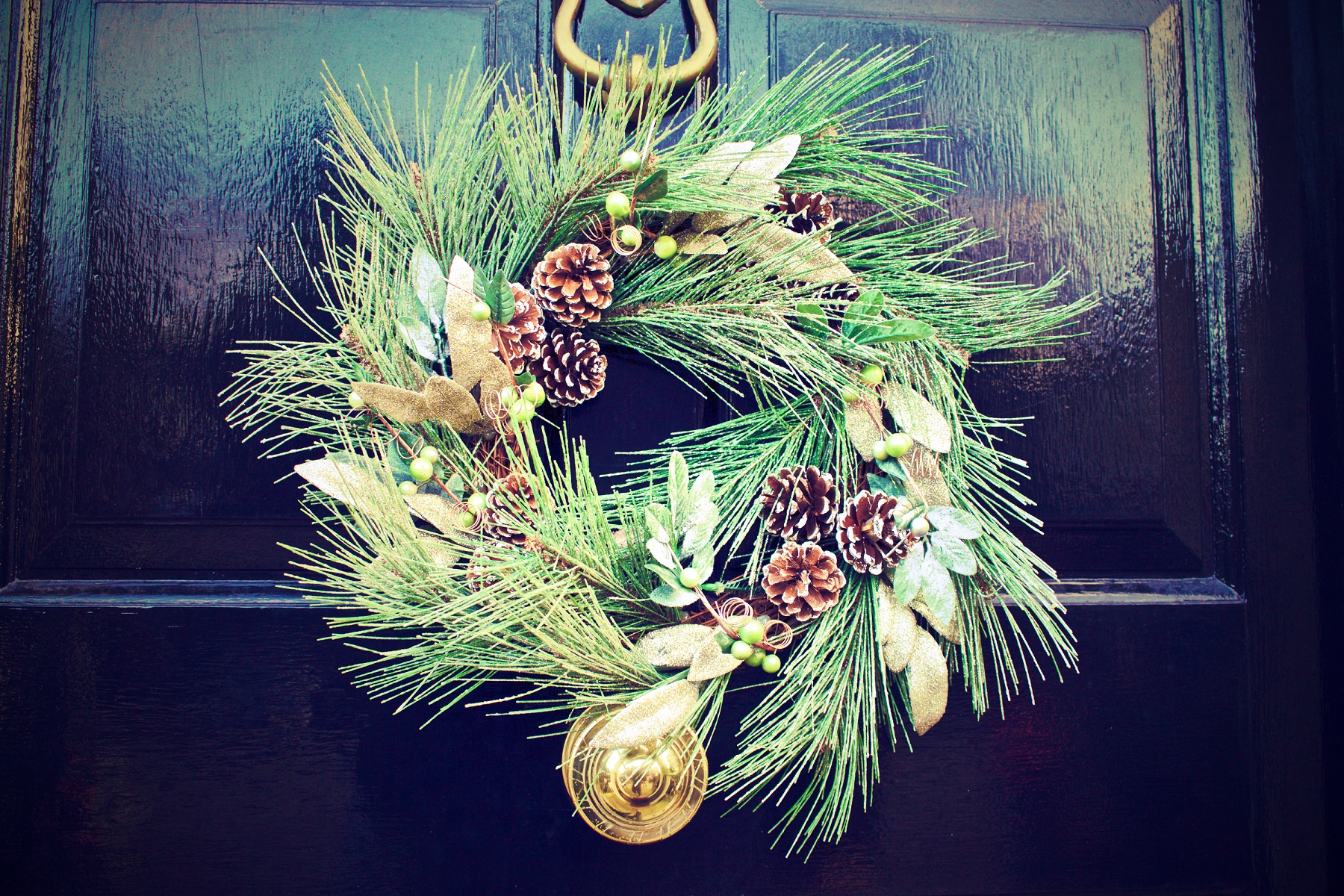 holiday budget decorating wreath on door